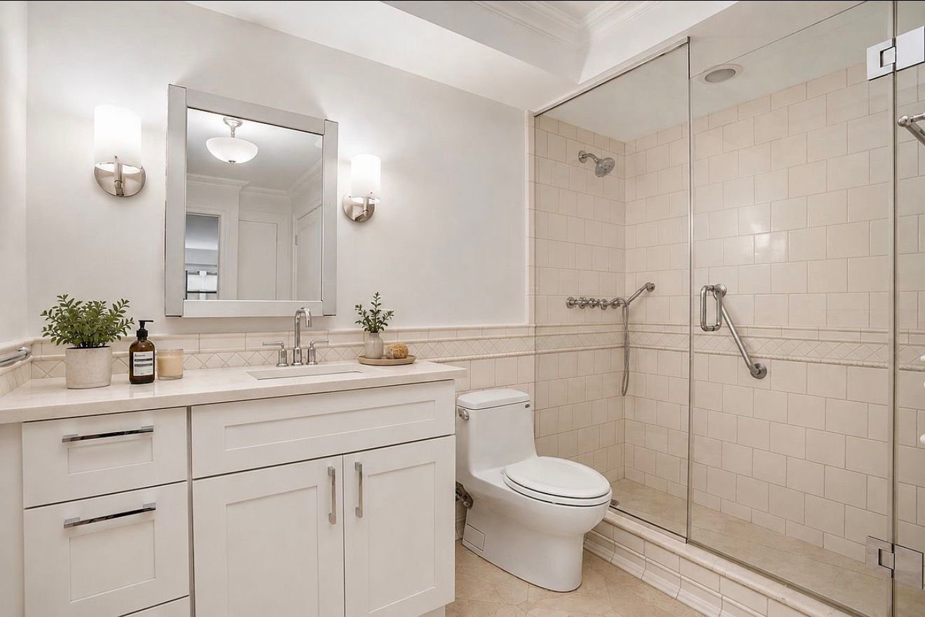 Designer bathroom with frameless glass