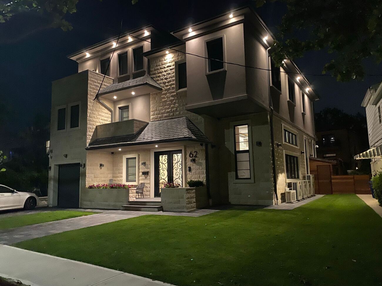 Custom home lit at night