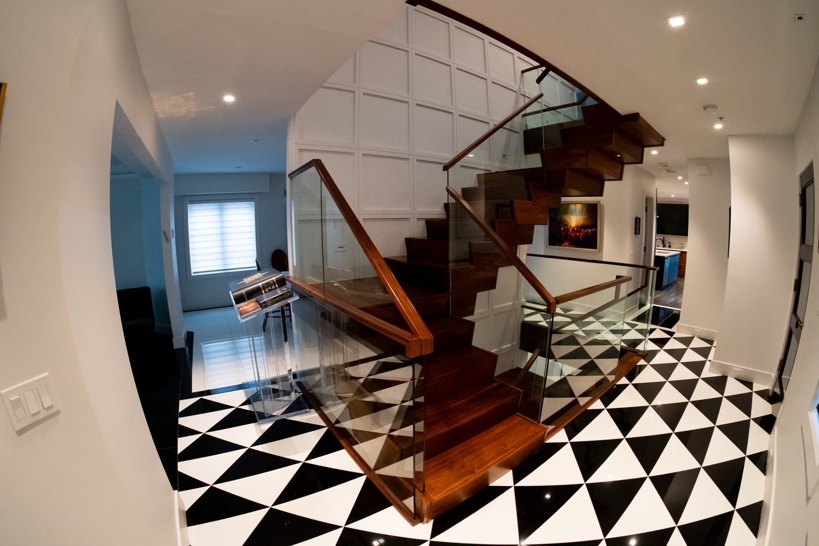Staircase and checkerboard floor